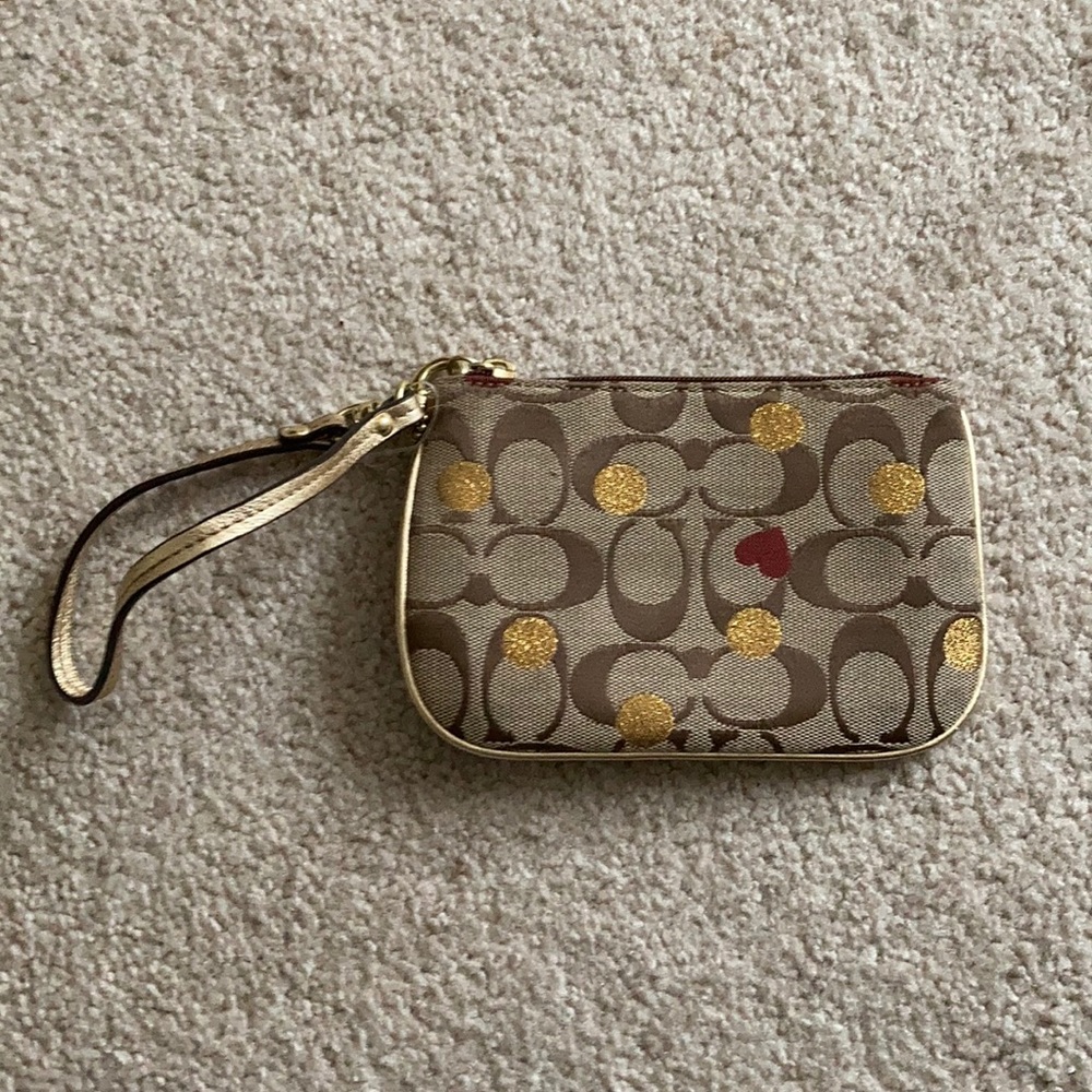 Coach heart and gold wristlet
